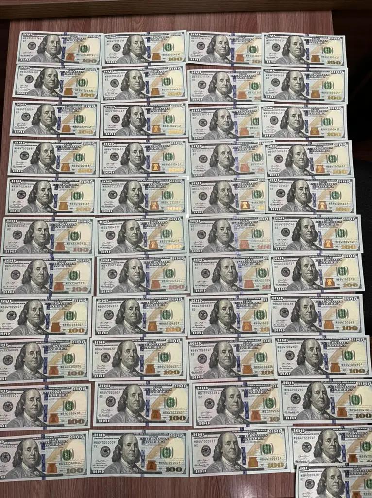 ГКНБ накрыл подпольный офис по изготовлению долларов США