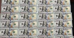 ГКНБ накрыл подпольный офис по изготовлению долларов США