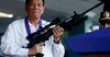 Филиппиндин Президенти пара талап кылган чиновникти атып салууга уруксат берди