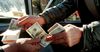 В Оше Нацбанком оштрафованы три валютчика