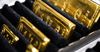 Унция золотого мерного слитка НБ КР подешевела на $5.6
