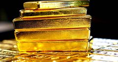 Унция золота аффинированных мерных слитков за день подешевела на $24.8