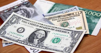 Доллар США потерял 0.31%. Курсы НБ КР